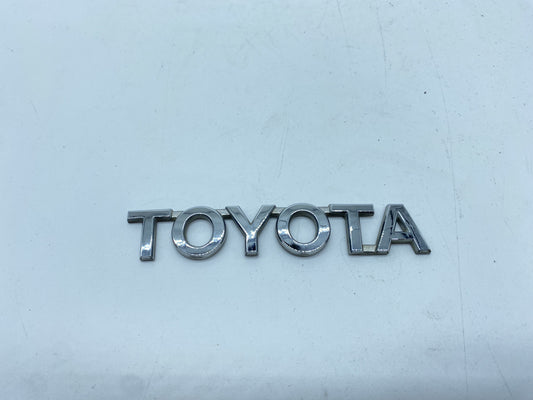 SCRITTA TOYOTA LOGO EMBLEMA SIGA BADGE FREGIO POSTERIORE ORIGINALE