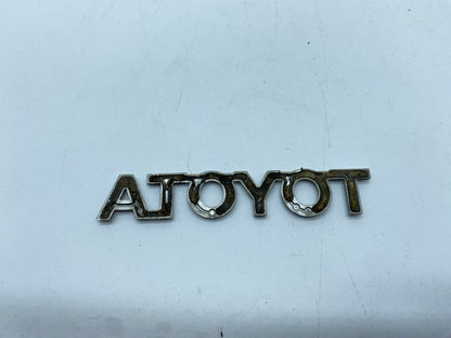 SCRITTA TOYOTA LOGO EMBLEMA SIGA BADGE FREGIO POSTERIORE ORIGINALE